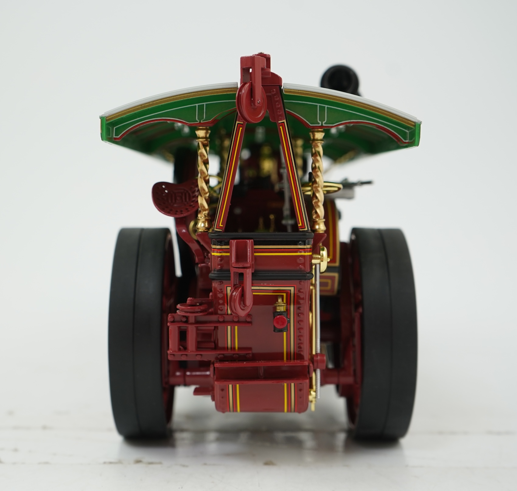 A Midsummer Models Ltd. 1:24 scale model of a Burrell Showman’s Engine, Earl Beatty, in ‘Anderson & Rowland’s Jungle Speedway’ livery, missing the original card box, but with an oak and Perspex display case